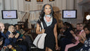 Juanita Ingram at London Fashion Week wearing Handmade Stories and Kathy Kyle Studio