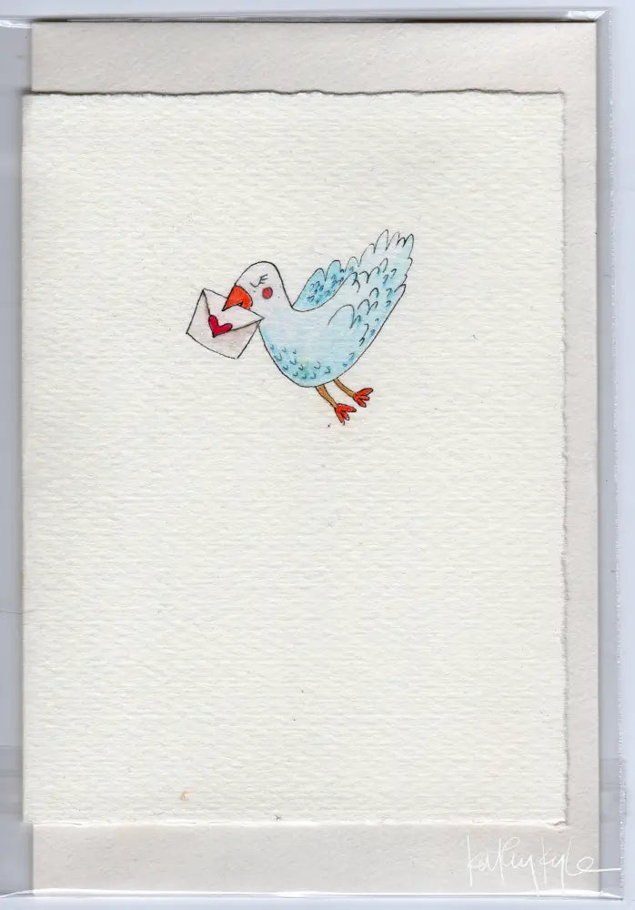 Dove holding love note